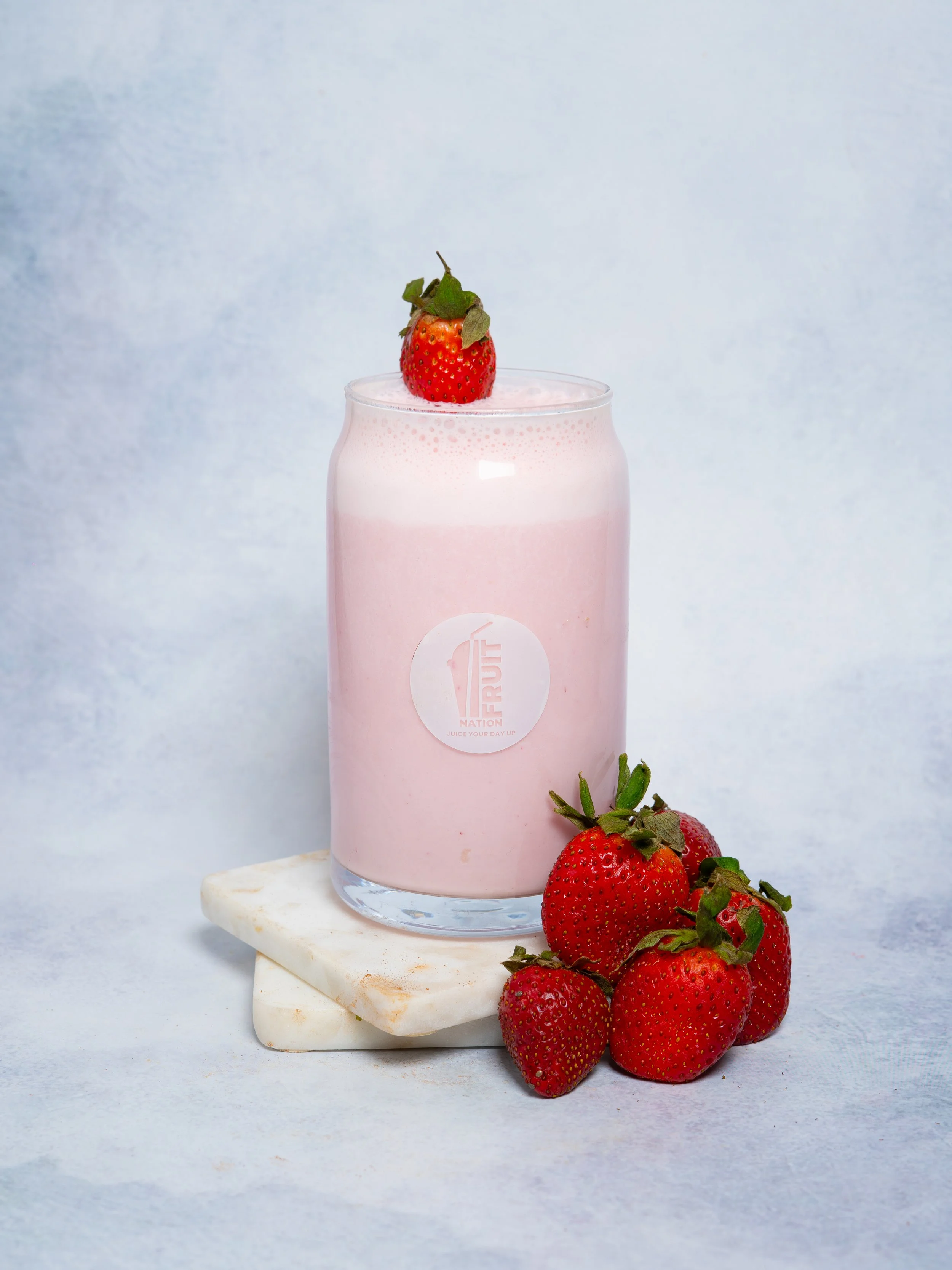 Brand product photography — strawberry milkshake
