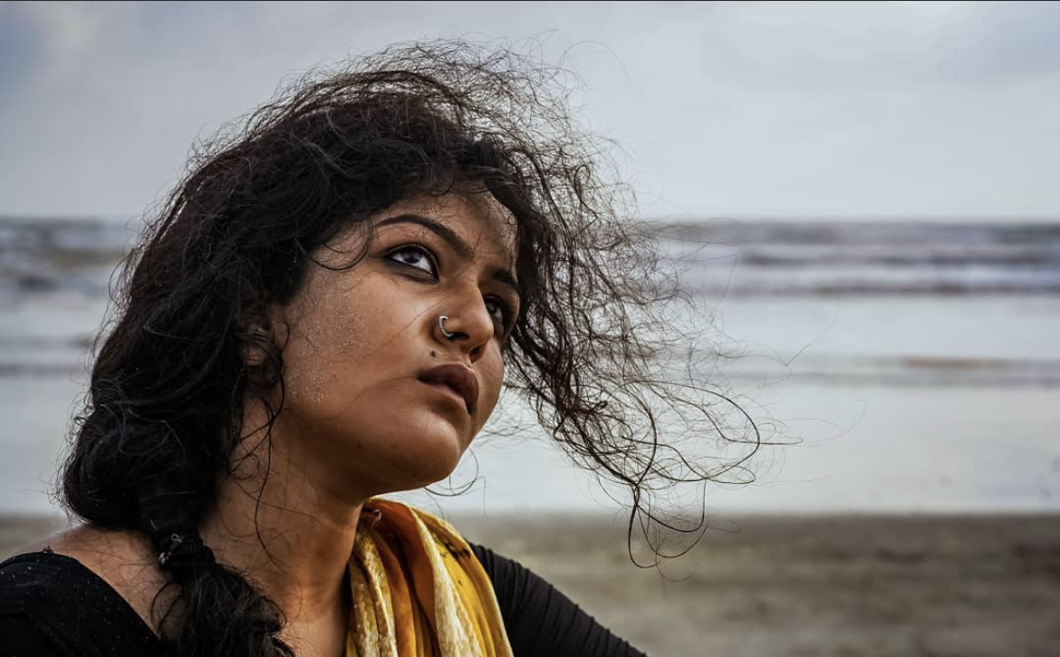 Creative portrait — woman at the beach