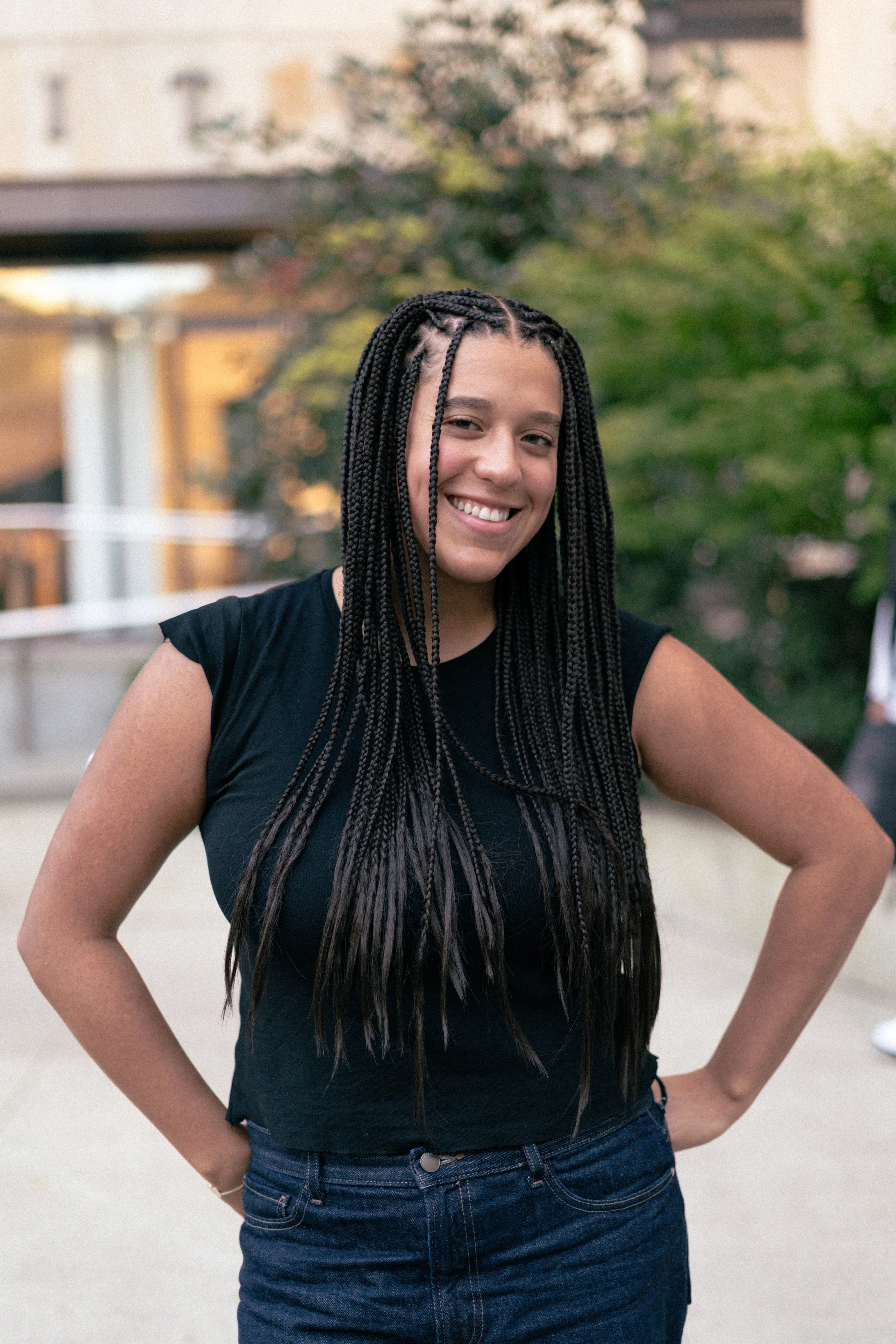 Professional headshot — woman with braids