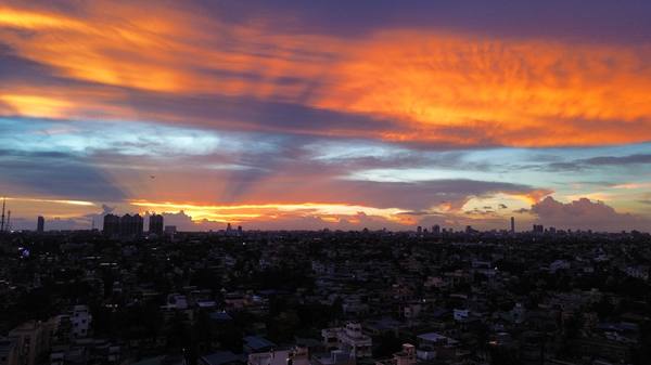 Aerial — city at sunset